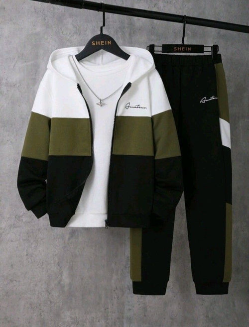 Two-piece tracksuit with a white, green, and black color scheme on a gray background.