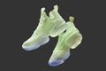 Light green sneaker on a white background