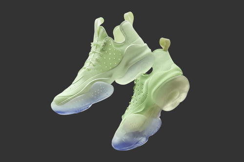 Light green sneaker on a white background